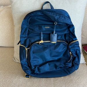 Navy blue & gold Tumi Voyageur backpack